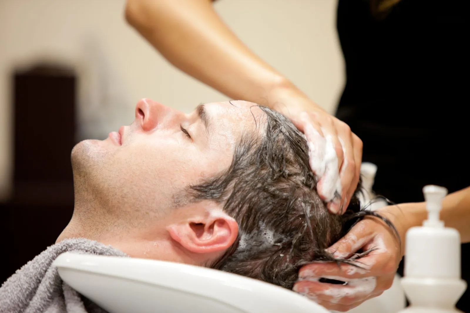Man getting Head Spa for Hair Thinning Treatment at Focal Point