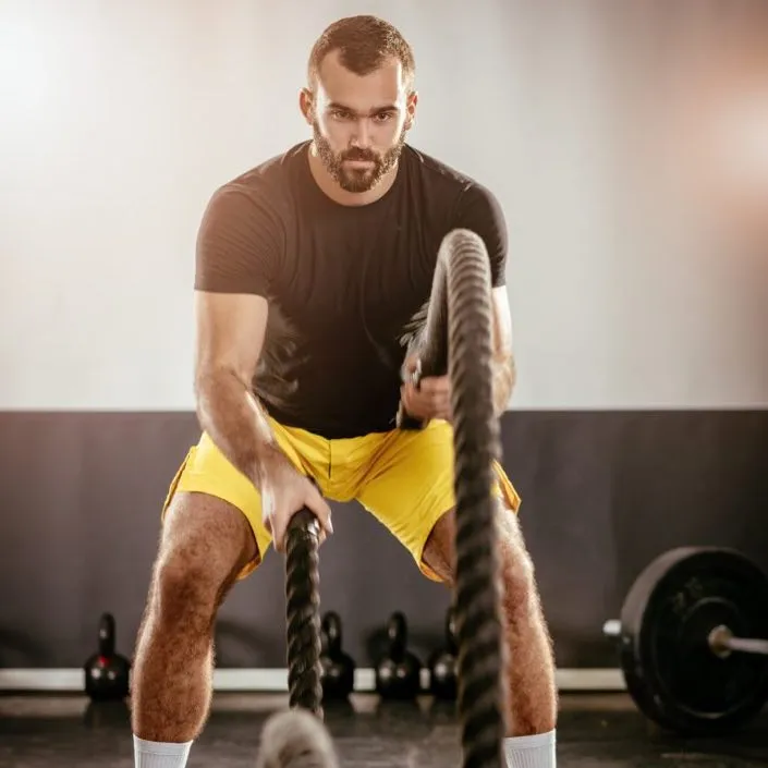 row-2-man-at-the-gym-with-ropes